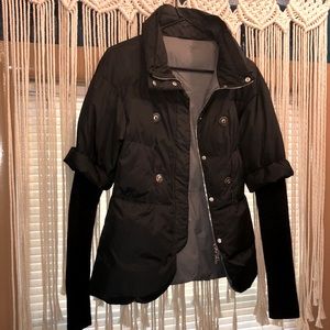 Brunello cucinelli cashmere down jacket with half sweater sleeves.